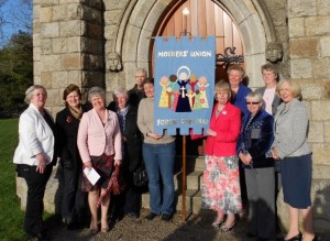 New Trustees, some of the embroiderers and the new banner.