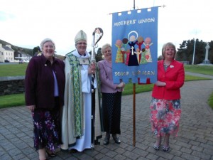 Barbara Taylor, Bishop Robert, Joyce Kermeen and Pat Costain with the New Diocesan Banner.